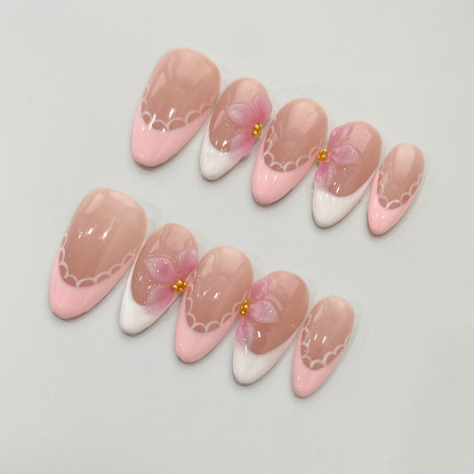 Floral Garden floral pink press-on nails on table | Floral Garden nail inspo