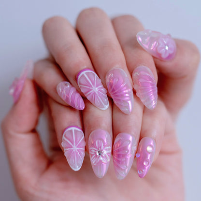 Purple Blush nail art close-up showing handcrafted art detailing on almond nails